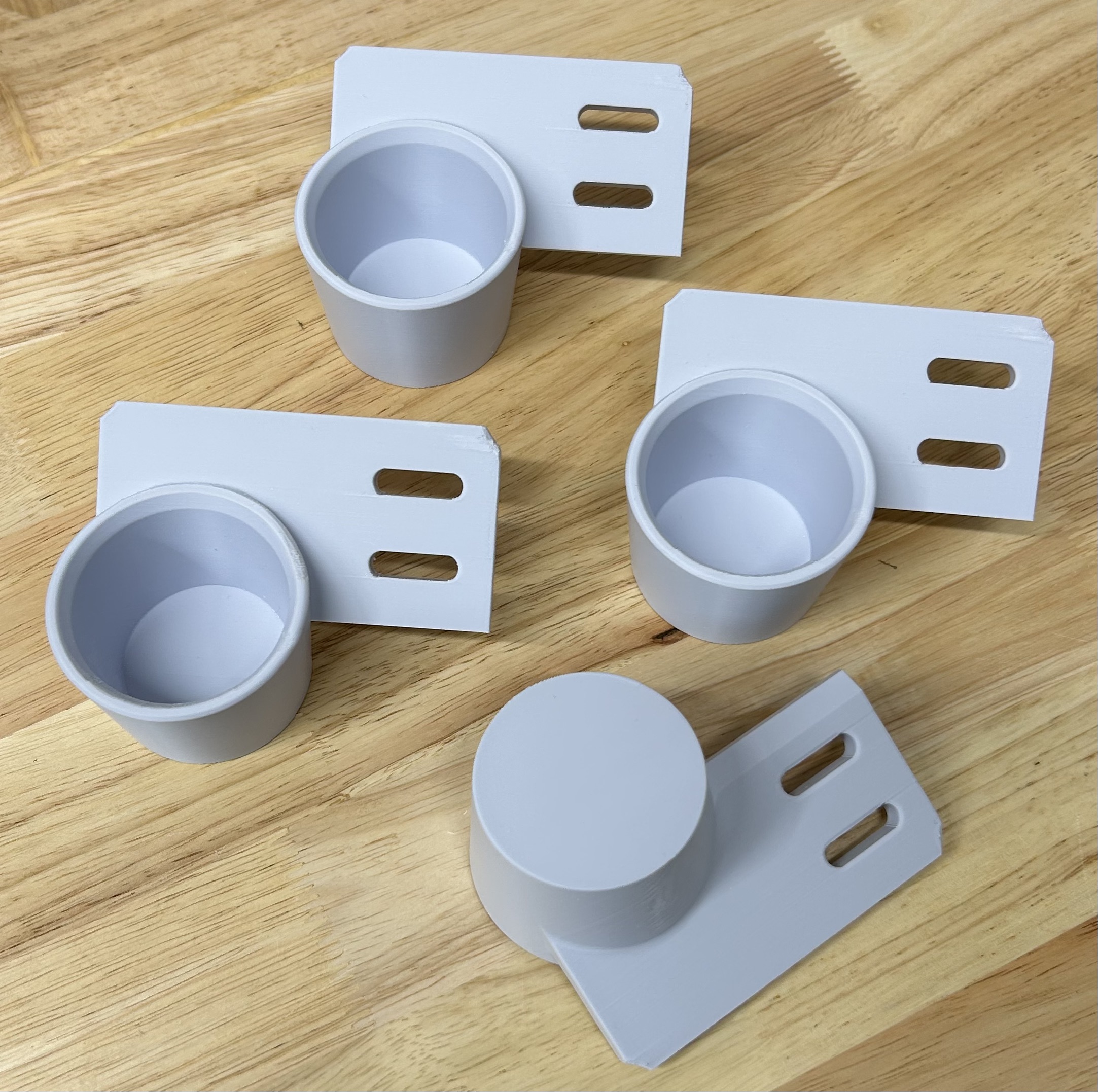 Becherhalter für Hotmelt-Klebedüse